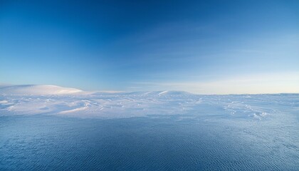Scenery depicting clear skies, cold winds and sub-zero temperatures amidst the ice and snow of the Arctic