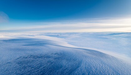 Scenery depicting clear skies, cold winds and sub-zero temperatures amidst the ice and snow of the Arctic