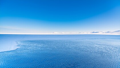 Scenery depicting clear skies, cold winds and sub-zero temperatures amidst the ice and snow of the Arctic