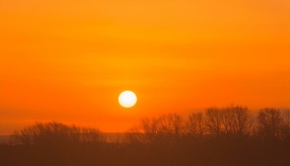 The point at which the temperature gradually drops in a bright orange sunset