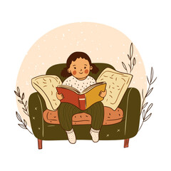 Fototapeta premium Child Reading a Book on a Sofa