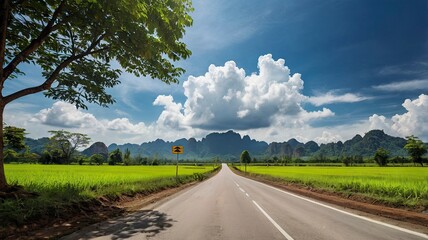 Country Road with Mountain and blue sky in Thailand.


