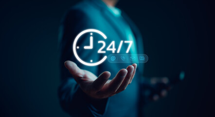 Call center support holding 24-7 icon for worldwide nonstop and full-time available contact of service concept. Assistance customer services, delivery. Technician ready for service 24 hours