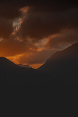 Dramatic sunset over the mountains of the Faroe Islands