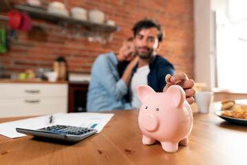 Couple savings concept with piggy bank