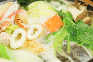 Japanese nabe, a classic winter dish of stewed crab, chicken, Chinese cabbage, fish meat, etc.