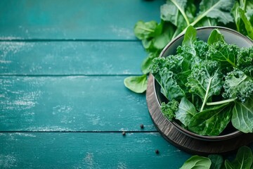 Fototapeta premium A close-up of fresh kale leaves, with intricate details of the veins and curly edges, placed on a rustic wooden table