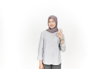 Smiling and showing okay sign, Approve sign Of Beautiful Asian Woman wearing hijab Isolated On White Background