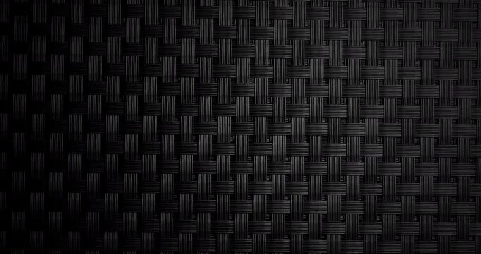 Seamless Black Woven Carbon Texture with Slow Camera Motion. A seamless loop of a black woven carbon fiber texture captured in slow, smooth camera motion. Ideal for industrial design.