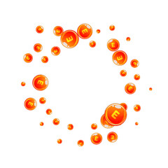 Vitamin E round capsules scattered randomly.