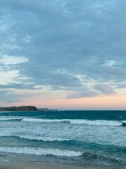 Sunset on Phillip Island near Melbourne, Australia. Watching the sunset over the ocean from the...