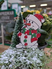 snowman with christmas tree
