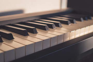 A digital piano keyboard close-up