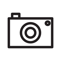Camera icon with lens, body, and flash, representing photography.