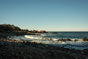 Rocky Coastline and Cliffs with Clear Skies