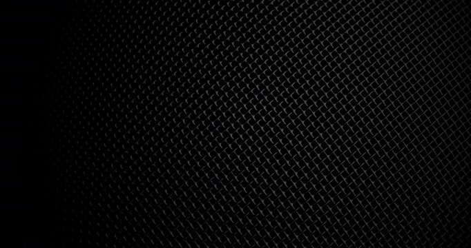 Rotating Black Metallic Mesh Texture with Smooth Motion. A high-resolution texture of black metallic mesh captured with smooth, continuous camera motion. Ideal for industrial design projects.
