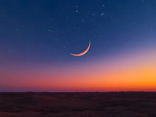 Crescent moon and stars over a tranquil landscape at sunset.