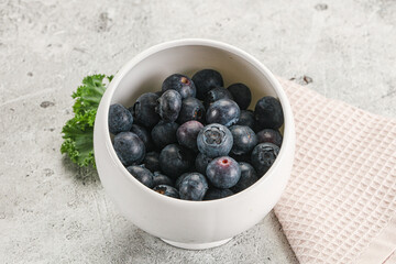 Sweet ripe blueberry on the bowl