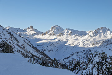 Fototapeta premium snow covered mountains in an alpine valley of Switzerland
