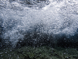 Air bubbles underwater rising to water surface, natural scene, bubbles under water, bubble...