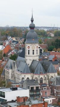 temse belgium town&rsquo;s church city hall residential areas village circling aerial drone shot view scenic river scheldt urban area european town 