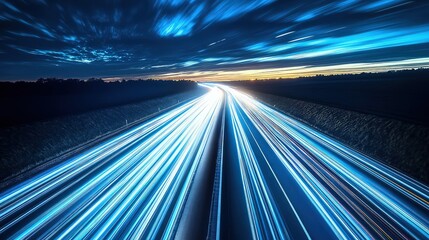 Highway light trails streak forward under a dark sky, symbolizing rapid data transfer.