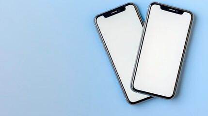 Showcasing modern smartphones on light blue background product photography minimalist design close-up view
