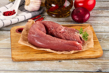 Raw pork tenderloin for cooking