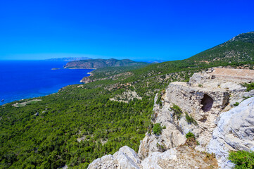 Monolithos Castle in paradise landscape scenery - travel destination on beautiful island Rhodes,...