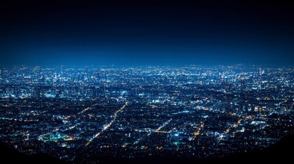 Naklejka premium Stunning Night View of a Vast Cityscape Illuminated by Millions of Lights