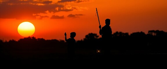 silhouette of a family in the sunset