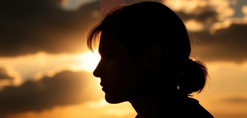 silhouette of a person in the sun