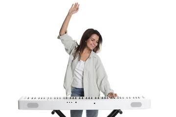 Smiling woman playing synthesizer on white background