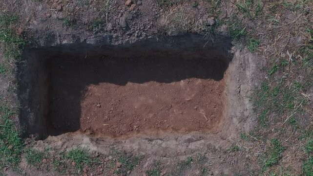 Top view of an empty grave