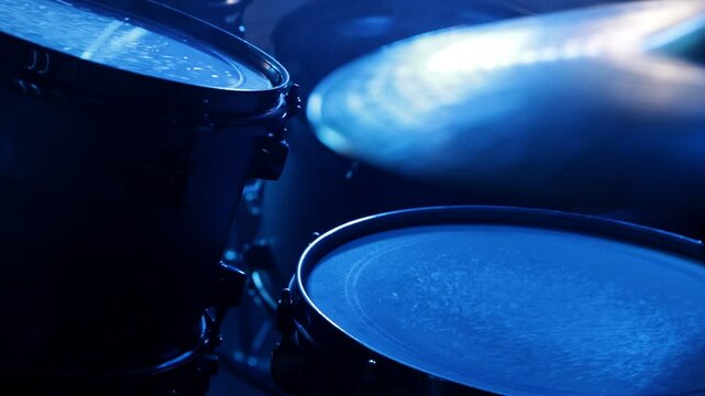 Drumsticks beat the cymbal . Drumming slow motion