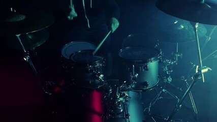 Drumsticks beat the cymbal . Drumming slow motion