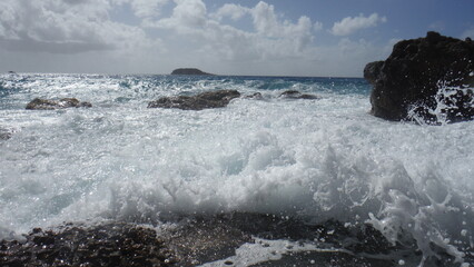 Beautiful sea and beach during a beautiful day in the Frech West Indies, more specifically in...