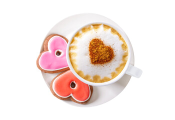 Cup of cappuccino coffee with drawn heart and colorful heart shaped cookies isolated on transparent background, top view