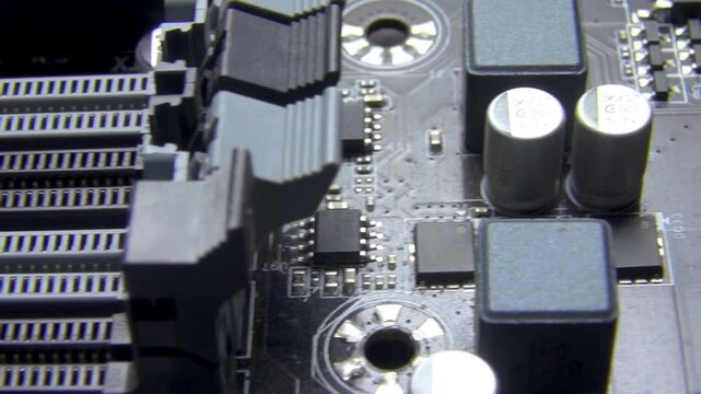 Close-up of a section of the printed circuit board showing memory slots