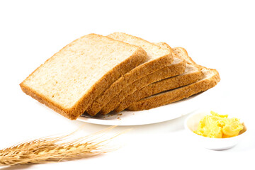 Slices of Whole Wheat Bread with Butter and Wheat
