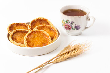 Delicious Mini Cheese Tarts with Tea and Wheat
