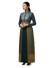 Asian woman in teal silk dress with gold accents, standing, hands clasped, against a plain white background.