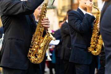 Band musicians with their instruments on the street. Typical music bands in Spain.