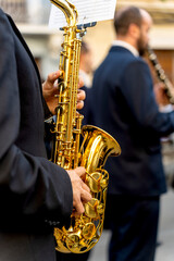 Fototapeta premium Band musicians with their instruments on the street. Typical music bands in Spain.