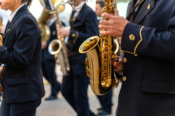 Band musicians with their instruments on the street. Typical music bands in Spain.