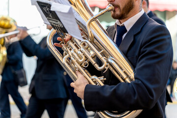 Band musicians with their instruments on the street. Typical music bands in Spain.