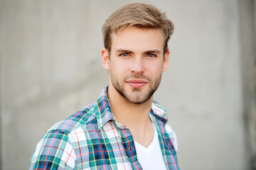 Portrait of man in casual style shirt. Stylish face portrait of unshaven guy. Handsome young man...