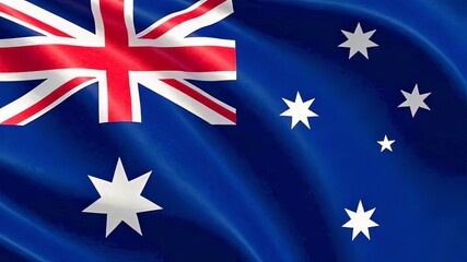 Flag of Australia on a flagpole horizontally on a light blue background. Festive concept of national unity of the country on Australia Day