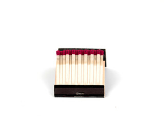 small red head matchbox on white background