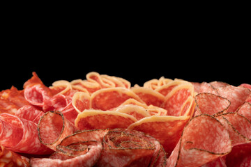 Different kinds of meat cuts on a board.